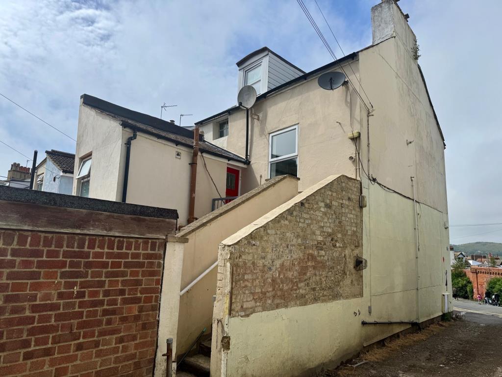 Lot: 56 - TWO-BEDROOM MAISONETTE - Rear and entrance to maisonette